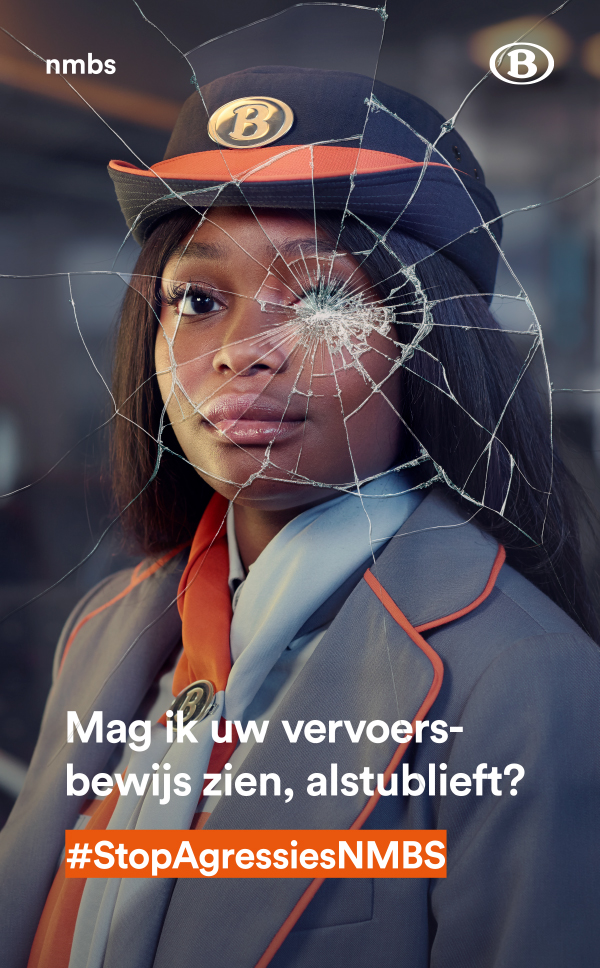 This is a photo of a train conductor with the text "Can I see your ticket, please" and the effect of smashed glass as if she has been punched in the face.