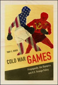 Two outlines of boxers filled with the American flag and US flag fighting. The bottom states "Cold War Games".