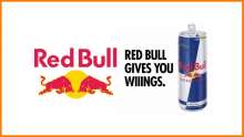 Can of red bull with the saying "Red Bull gives you wings"